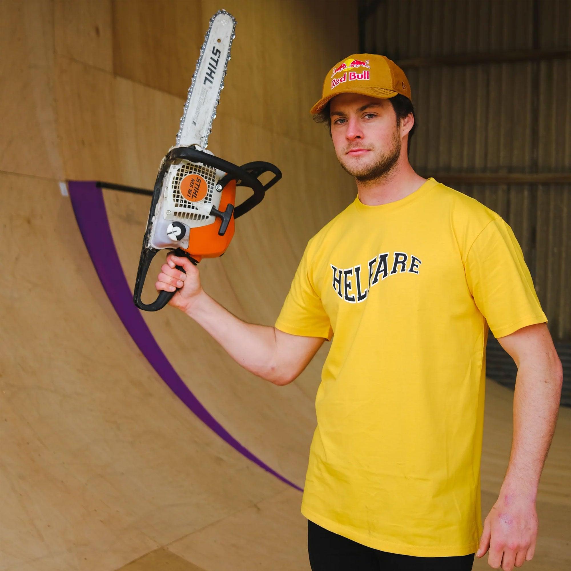 HELFARE Varsity T-Shirt I Yellow | Pose with Saw